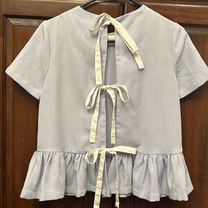 Tie-back Detailed, unique, peplum blouse